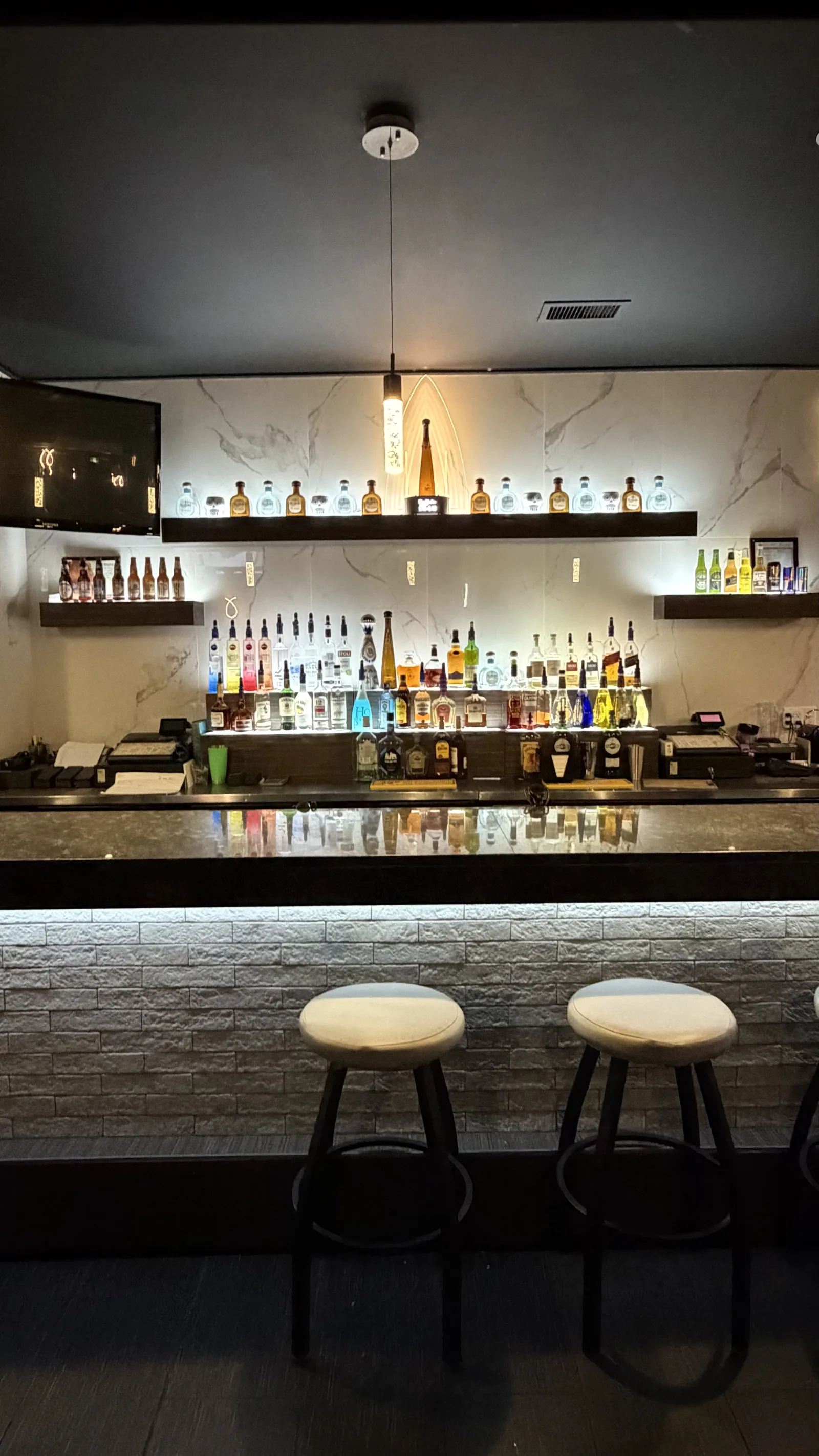 Front bar and bar stools at Cheetah's of Windsor
