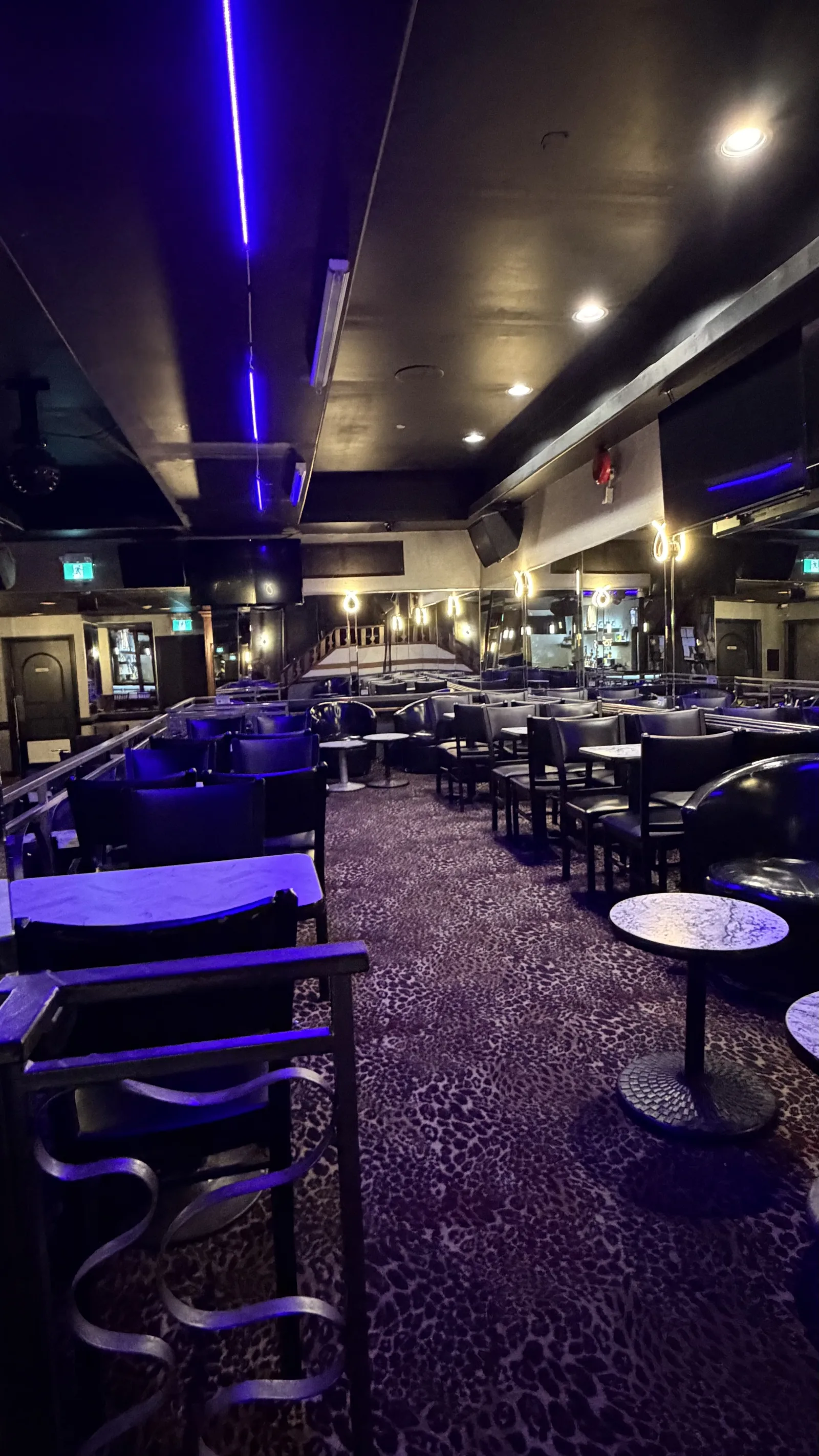 View along the lounge and tables at Cheetah's of Windsor